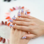 Inicio 3 beautiful-manicure-on-color-palette-background.jpg